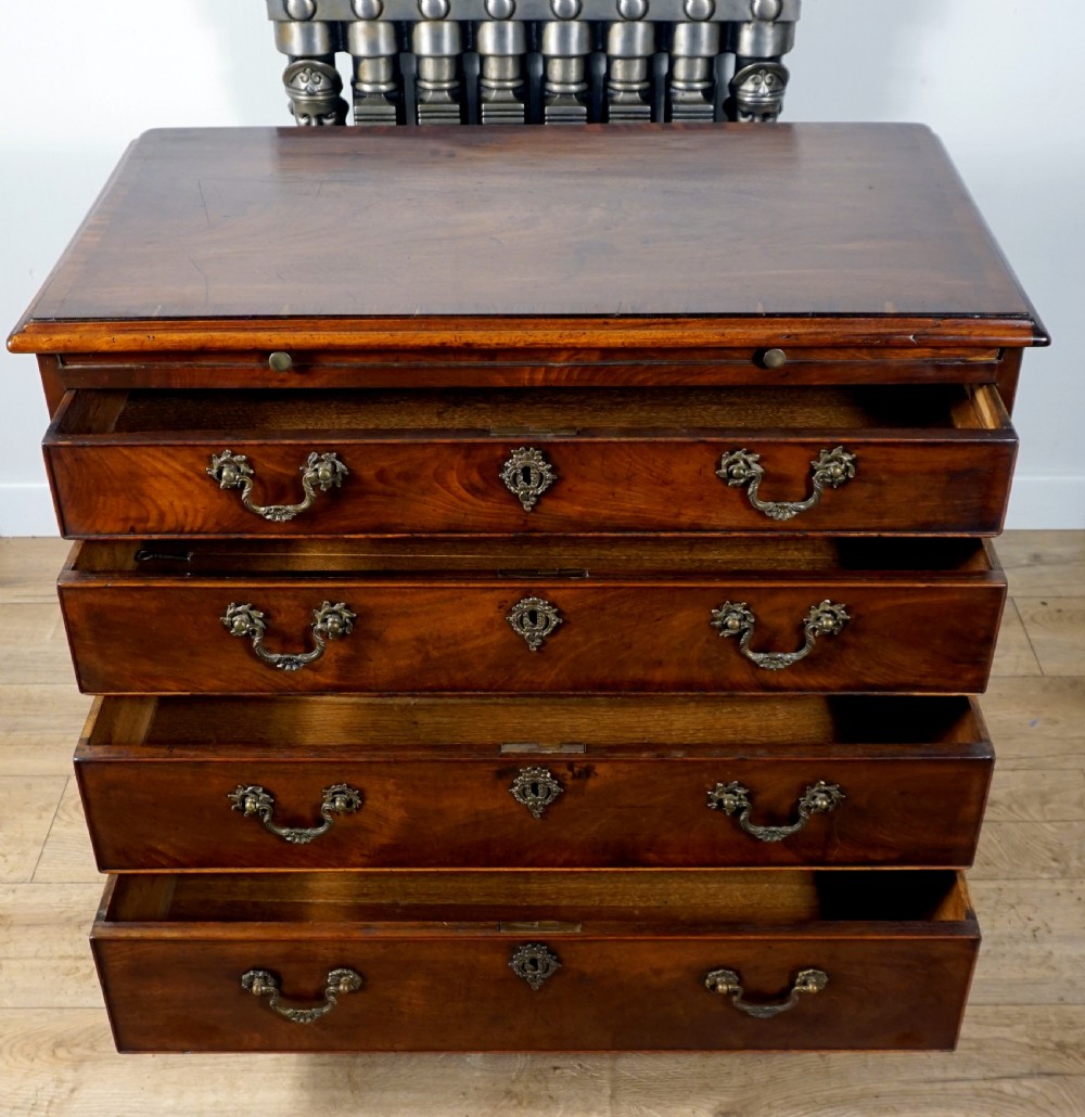 A superb example of a small Georgian chest with brushing slide  View III