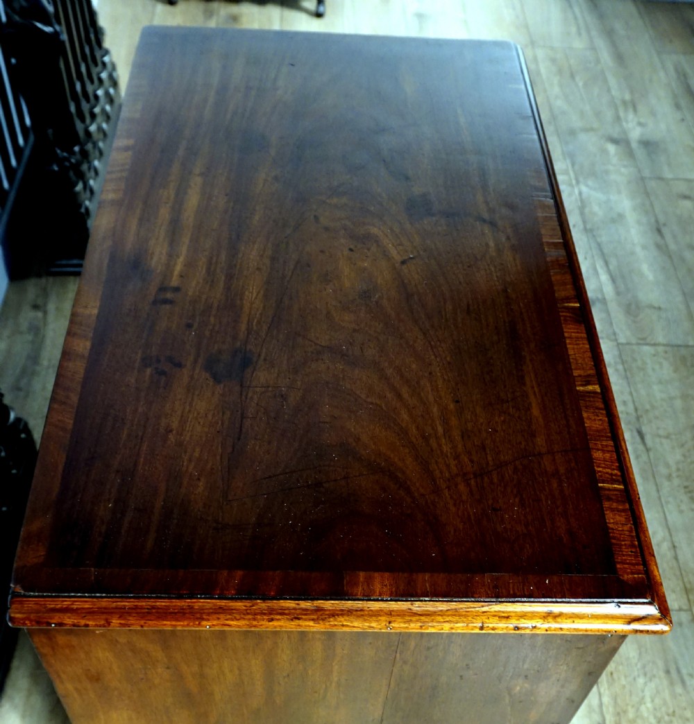 A superb example of a small Georgian chest with brushing slide  View VI