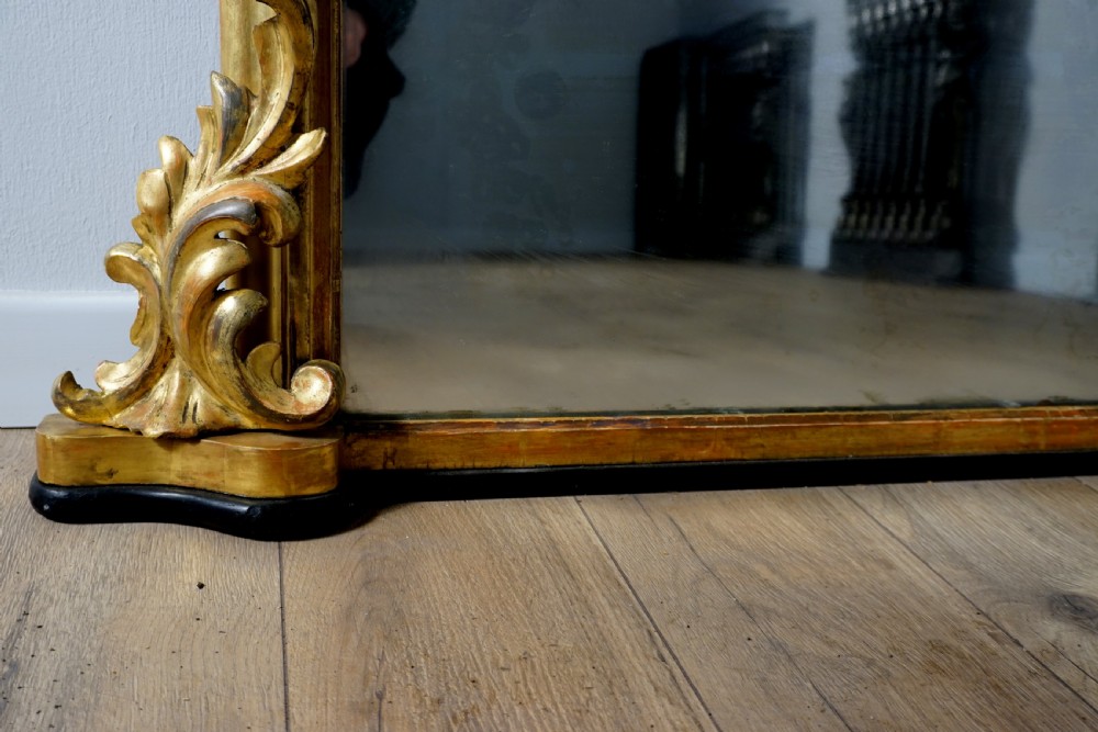 A good carved and gilded regency English overmantle mirror View VI