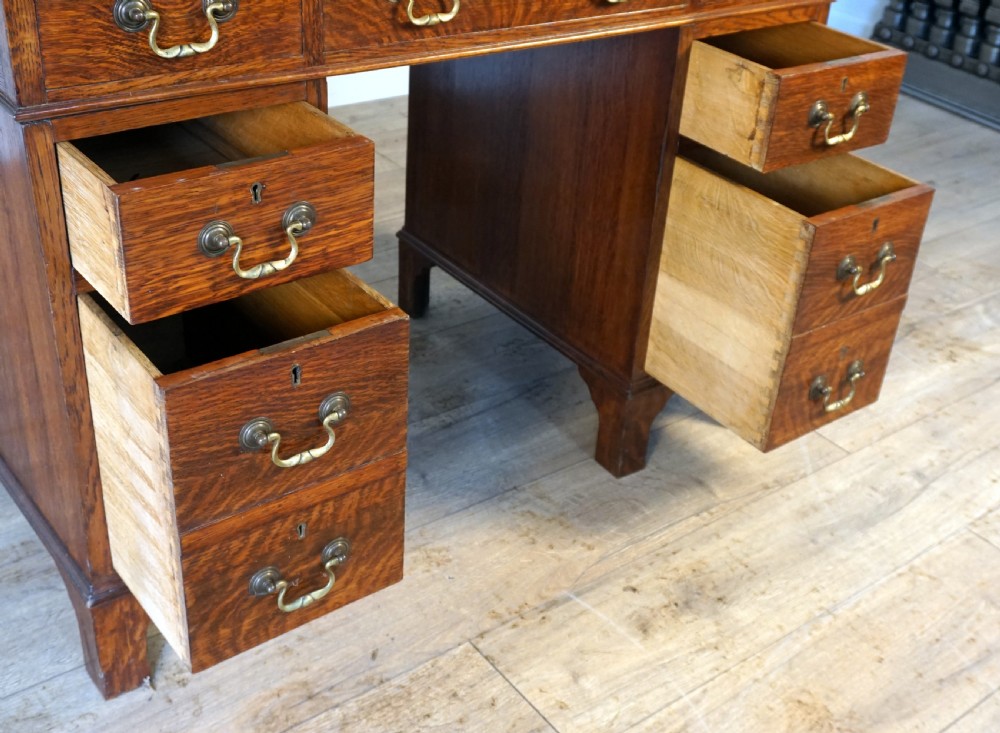 A good original solid oak small size pedastal writing desk View VI