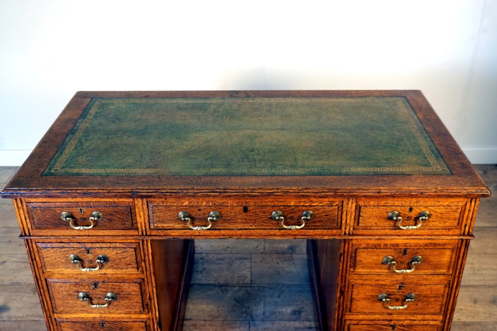 A good leather top late Victorian oak pedastal desk View II