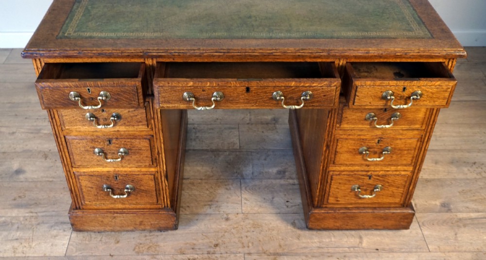 A good leather top late Victorian oak pedastal desk View III