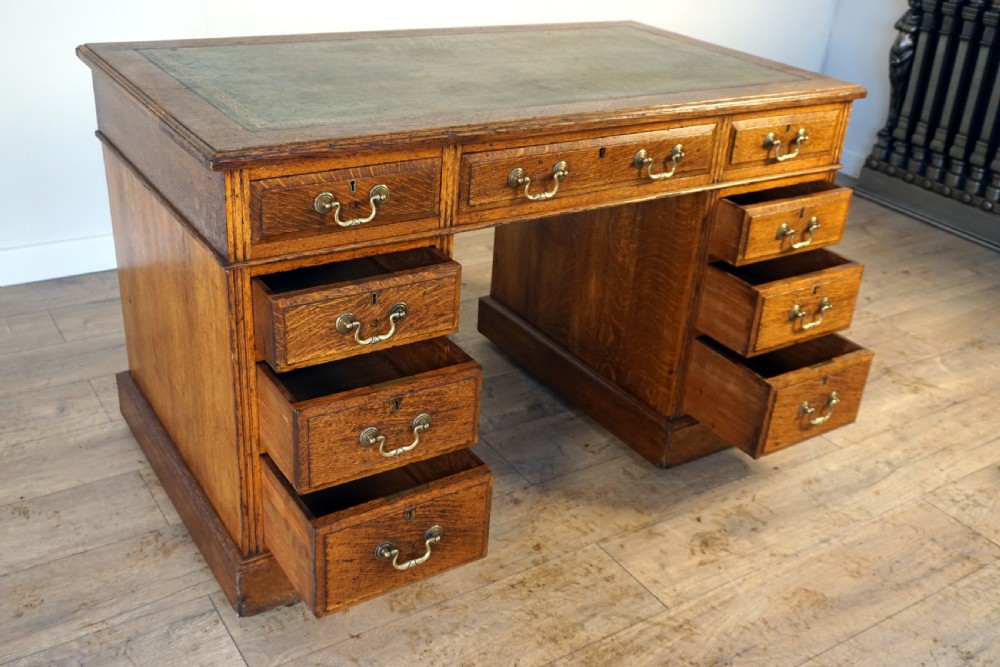A good leather top late Victorian oak pedastal desk View IV