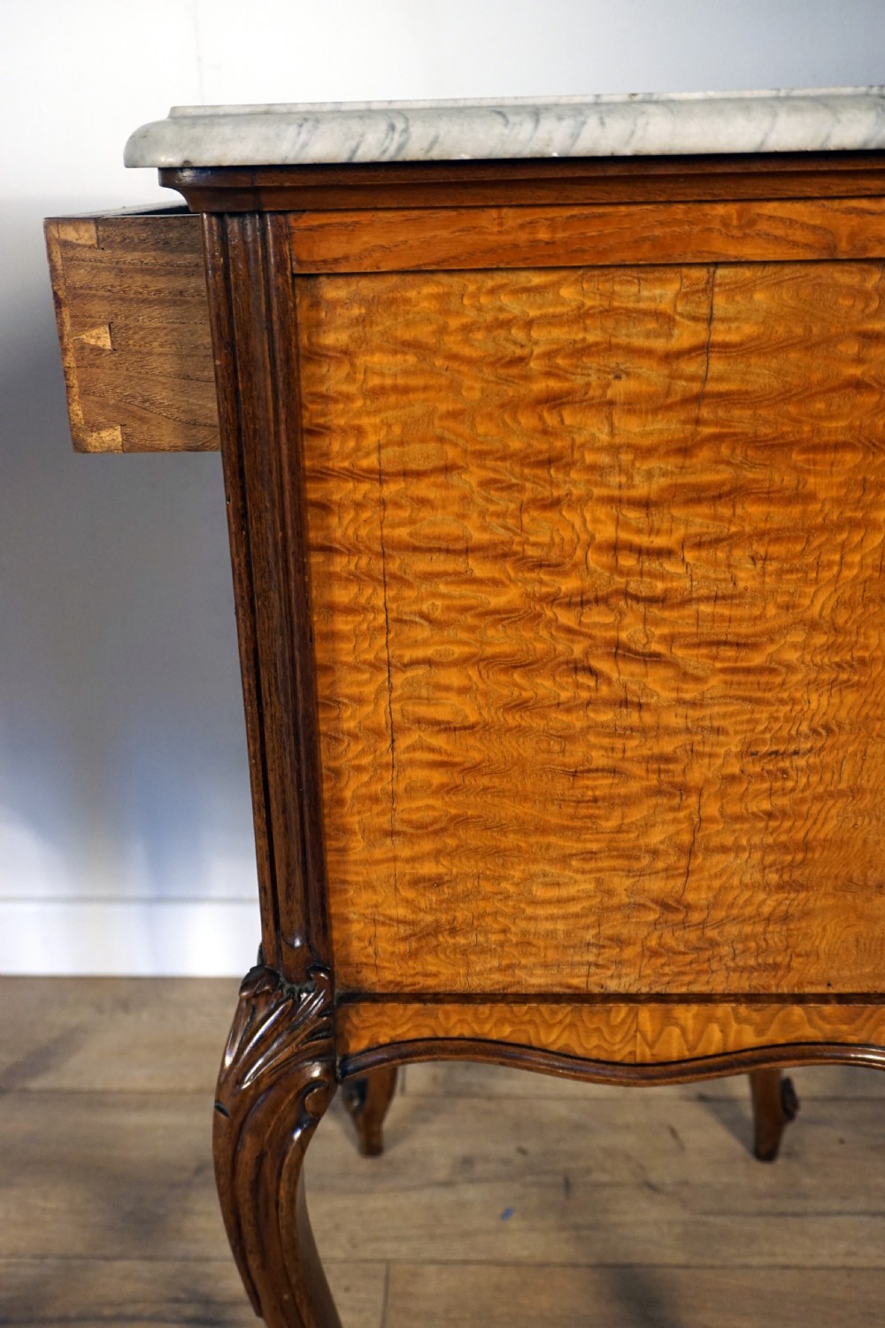 A good pair of French burr Sycamore marble top bedside cabinets  View IX