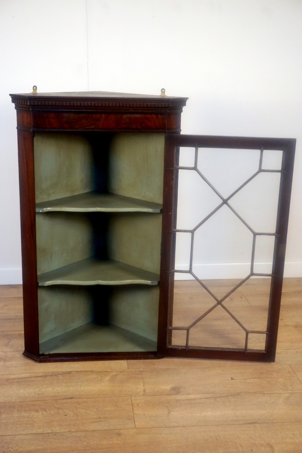 A good clean Mahogany George 111 Astragal glazed wall hanging corner cupboard  View III