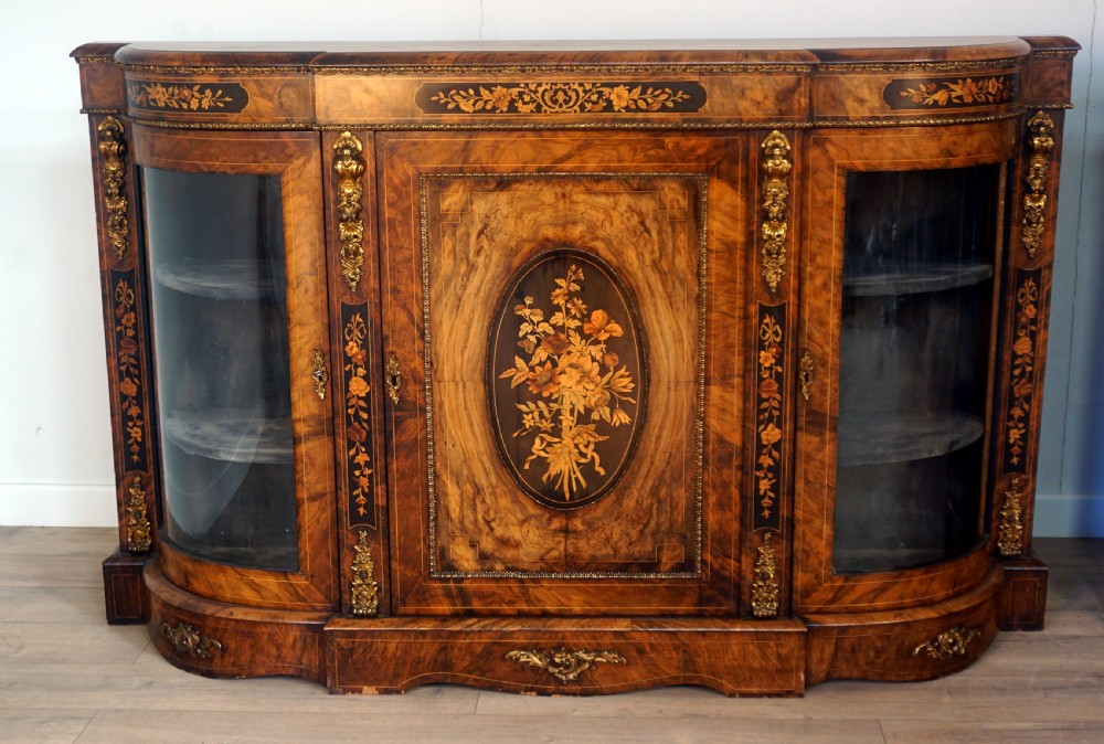 An outstanding matching pair of Victorian burr walnut ormolu and marquetry credenzas View II