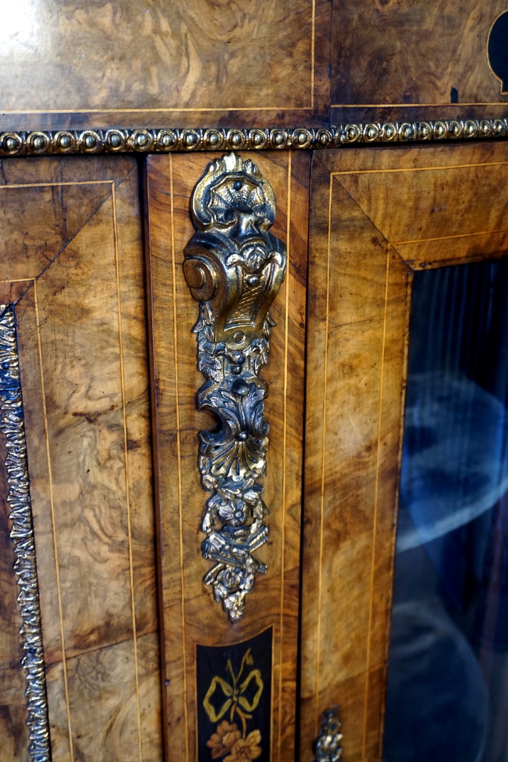An outstanding matching pair of Victorian burr walnut ormolu and marquetry credenzas View VI