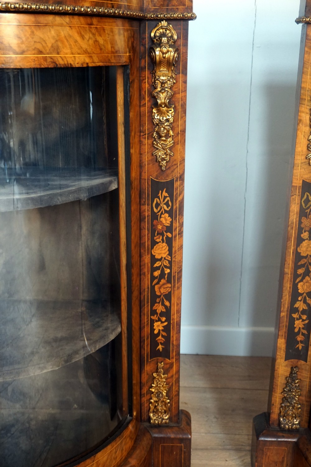 An outstanding matching pair of Victorian burr walnut ormolu and marquetry credenzas View VIII