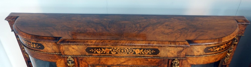 An outstanding matching pair of Victorian burr walnut ormolu and marquetry credenzas View IX