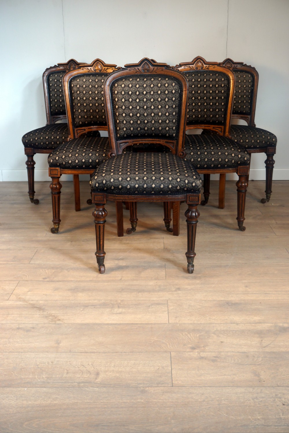 A good set of 6 oak Victorian chairs by Christopher Pratt and son Bradford