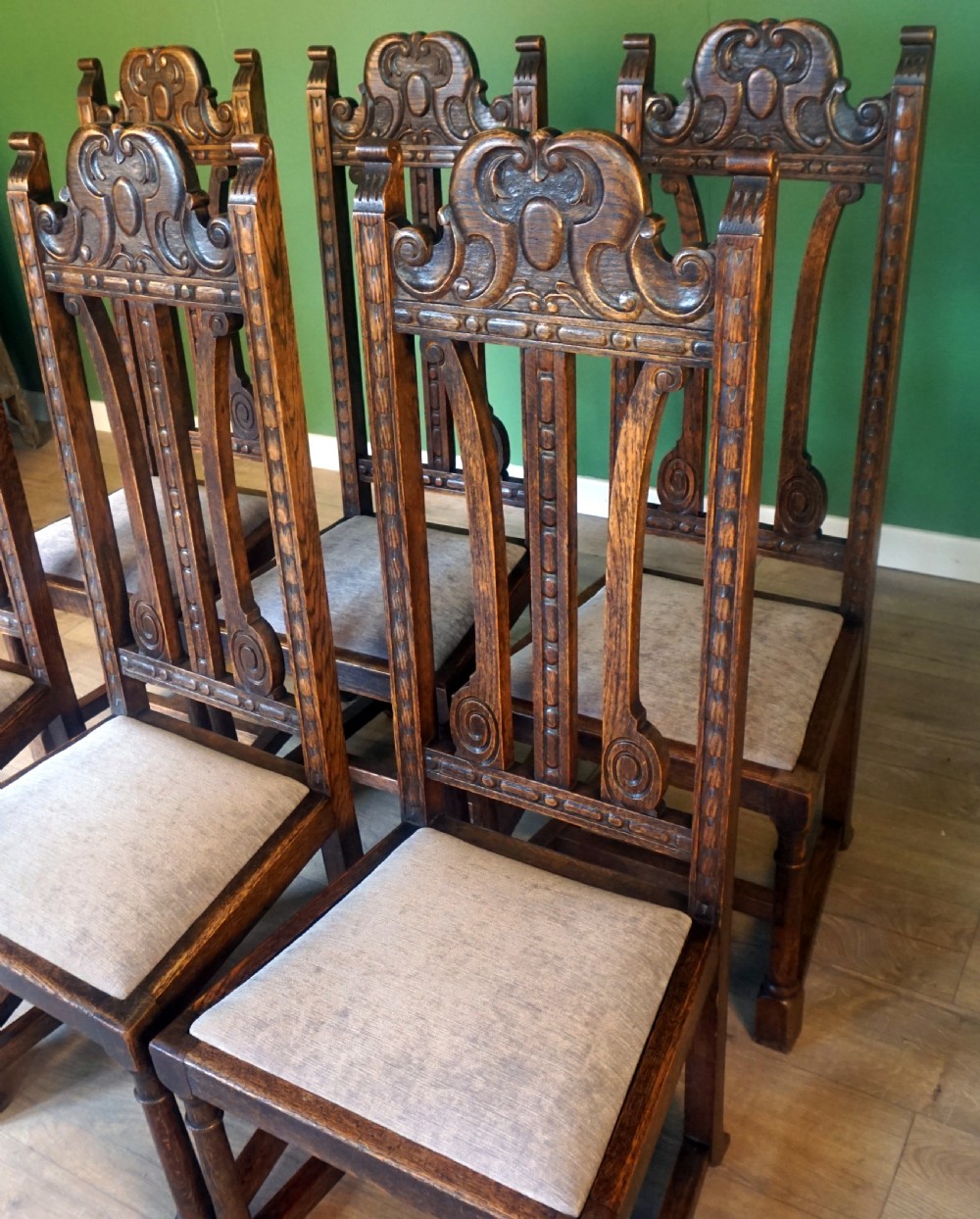 A good substantial set of 8 solid oak carved chairs View V