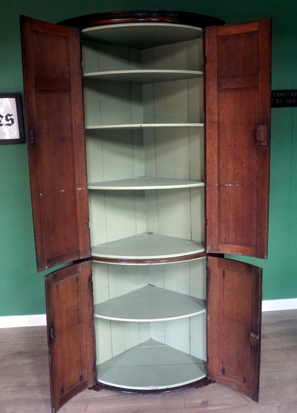 A great original example of a bow fronted Oak Georgina floor standing corner cupboard View VII