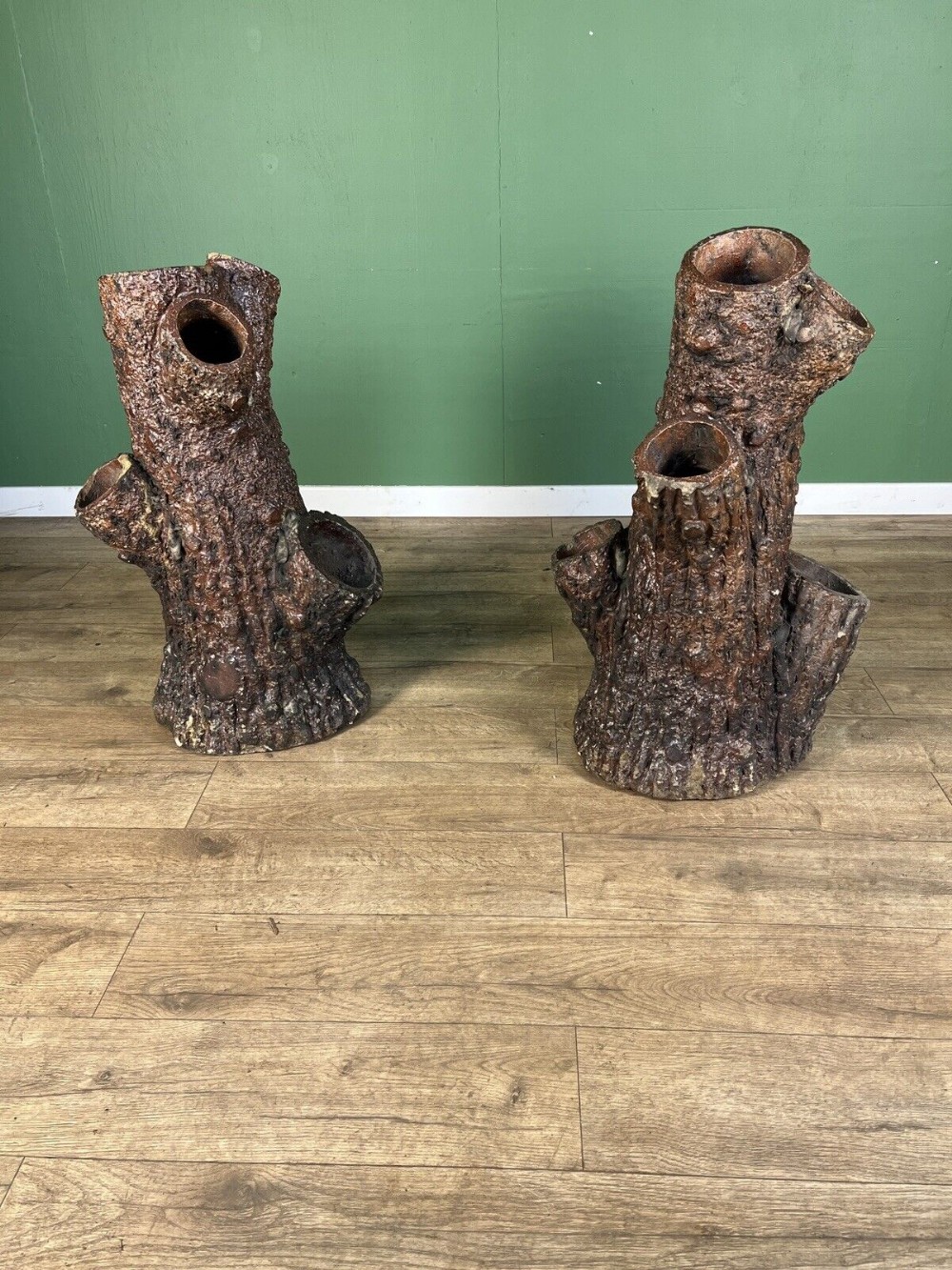 An exceptional pair of salt glazed faux bois strawberry planters