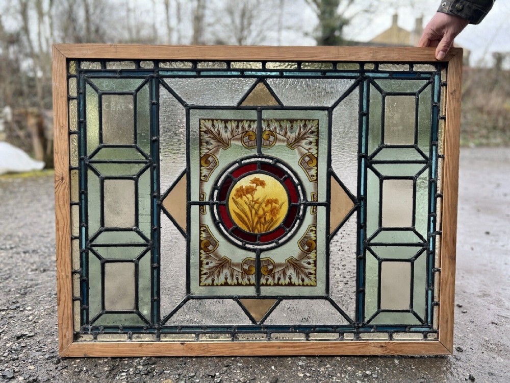 Antique stained glass window - painted flowers