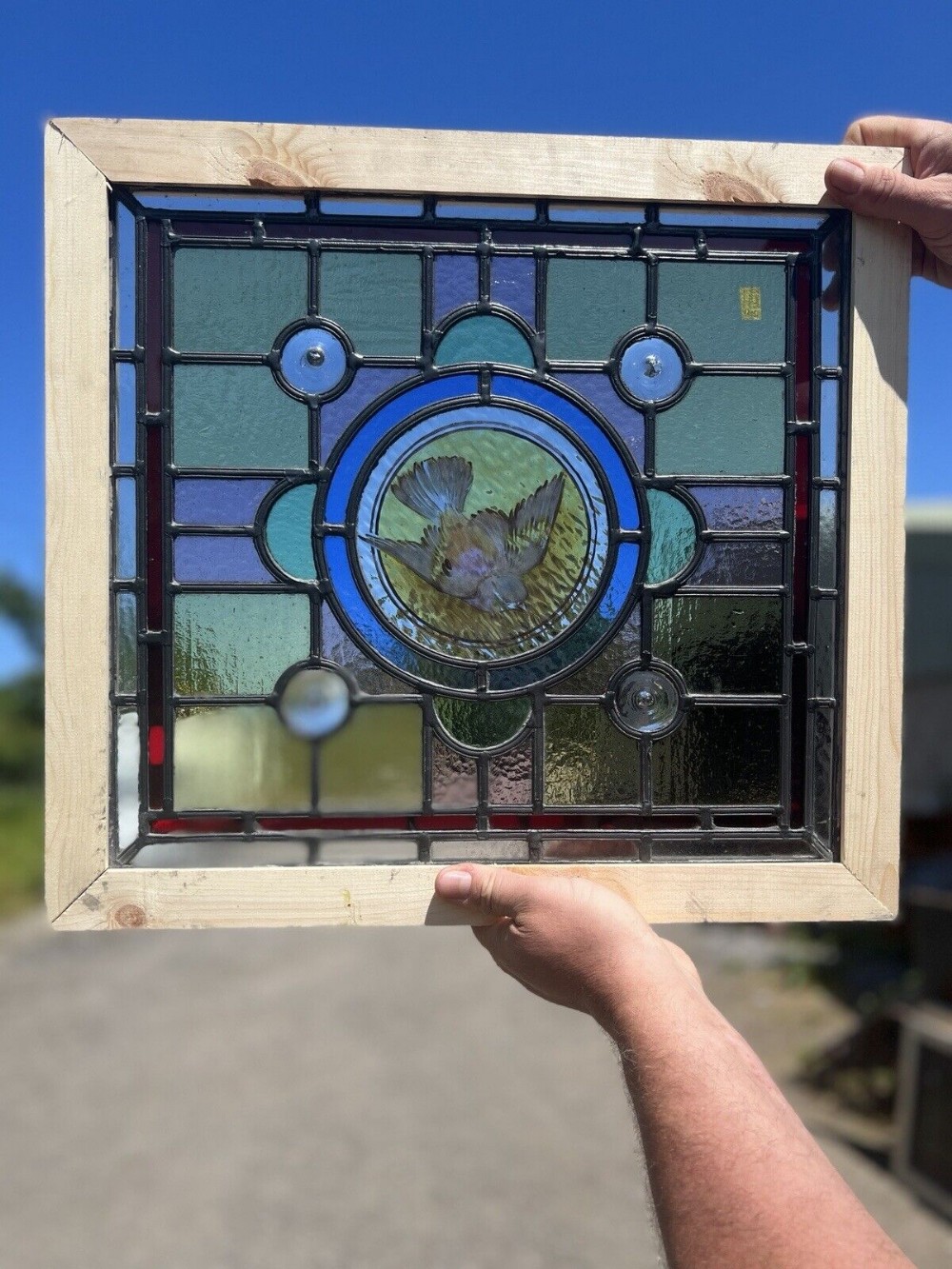 Painted and leaded glass window bird centre