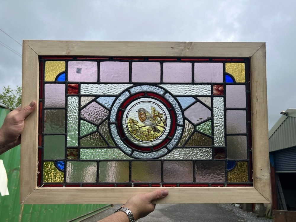 Stained glass window - painted bird