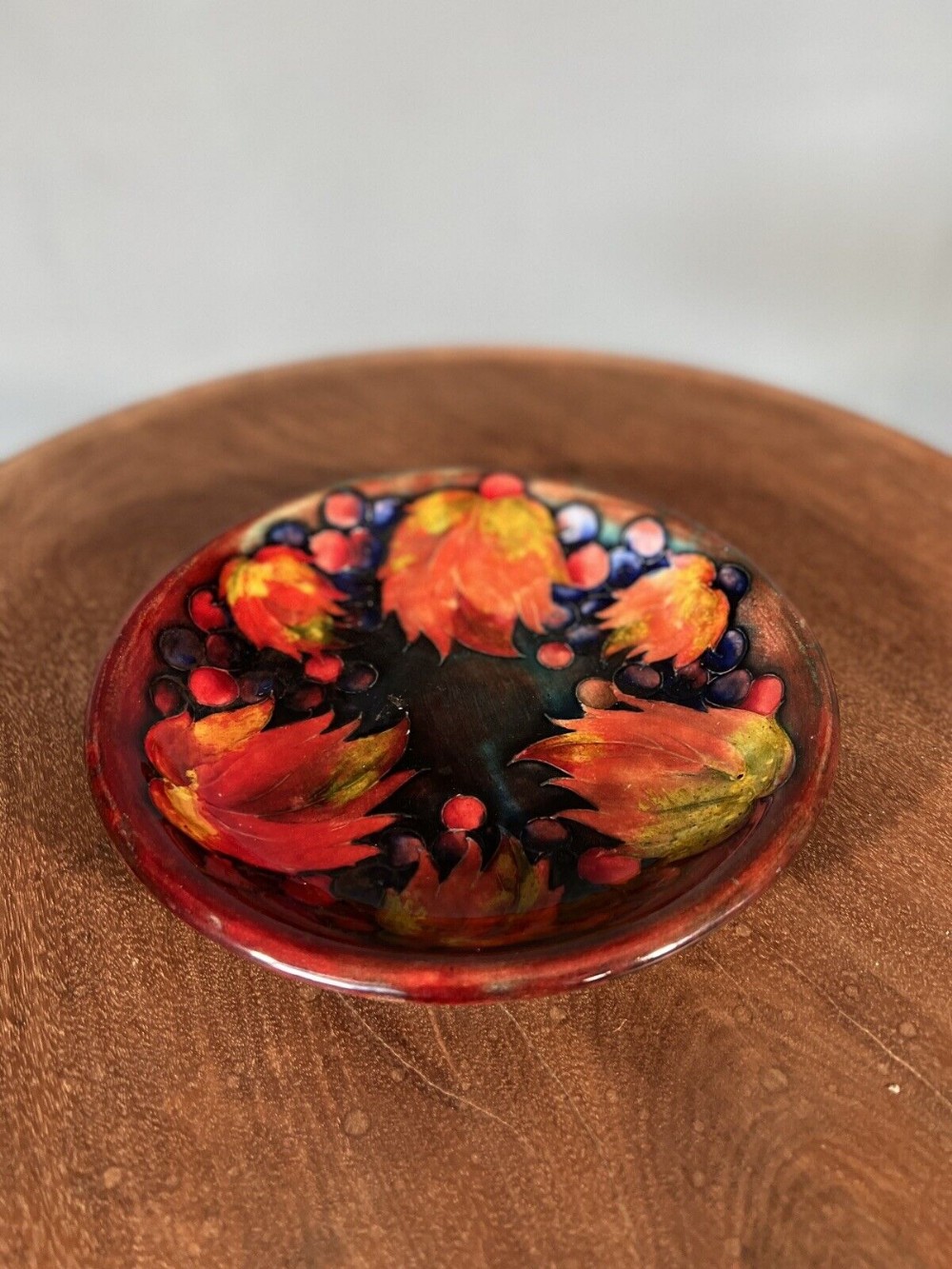 William moorcroft 1920’s Flambé leaves and fruit patterned shallow bowl