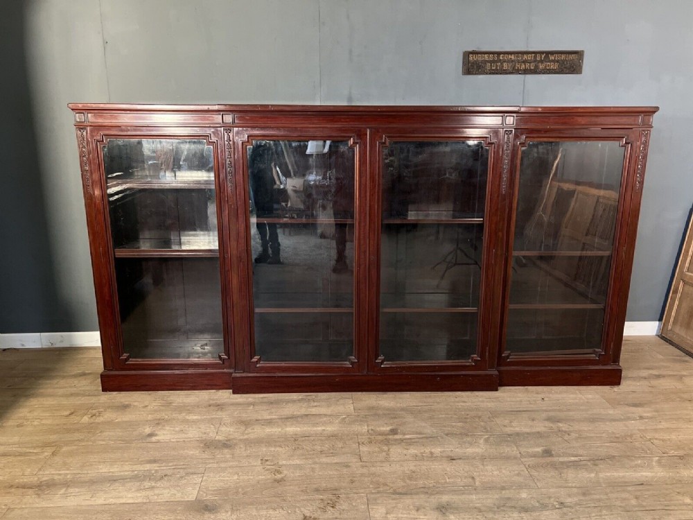 A good late Victorian mahogany 4 door breakfront bookcase