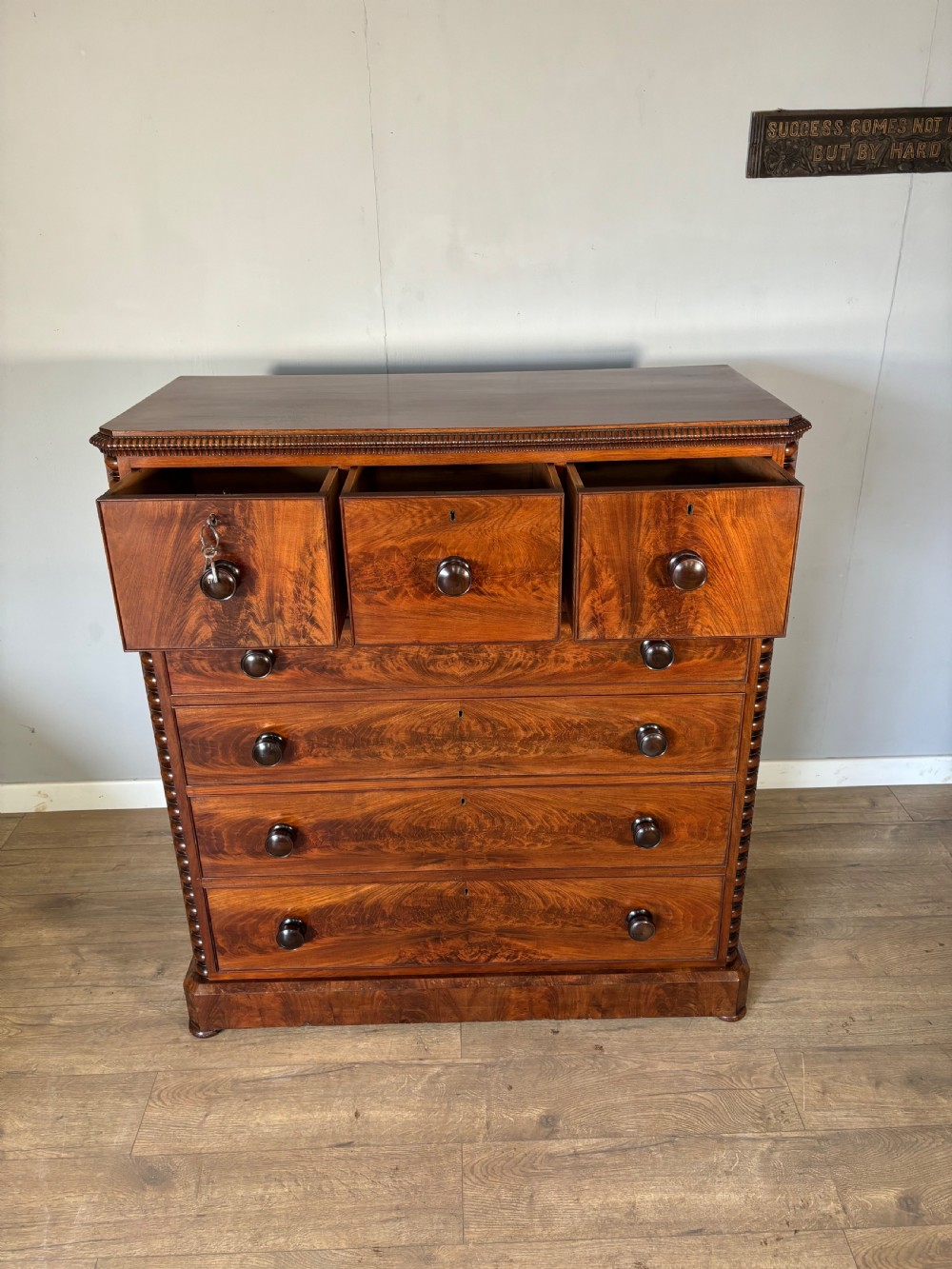 An exceptional quality Antique flame mahogany veneered Scotch chest View V