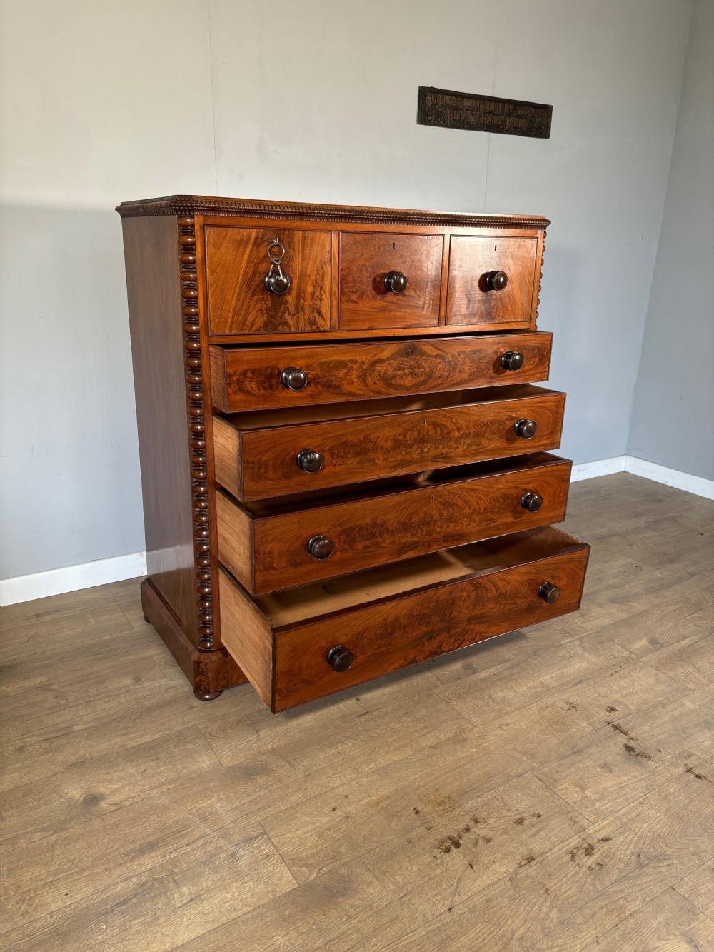 An exceptional quality Antique flame mahogany veneered Scotch chest View VI