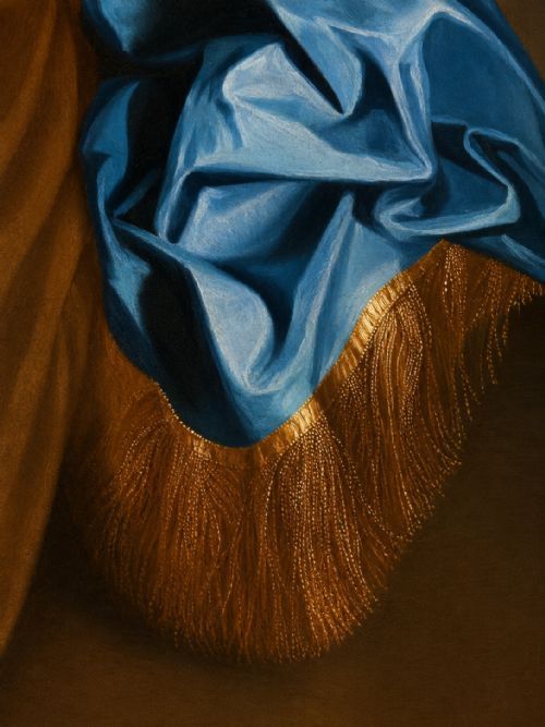 fig 4. A seventeenth-century Baroque oil portrait of a lady in a brown dress and blue drapery, set within a carved giltwood frame.