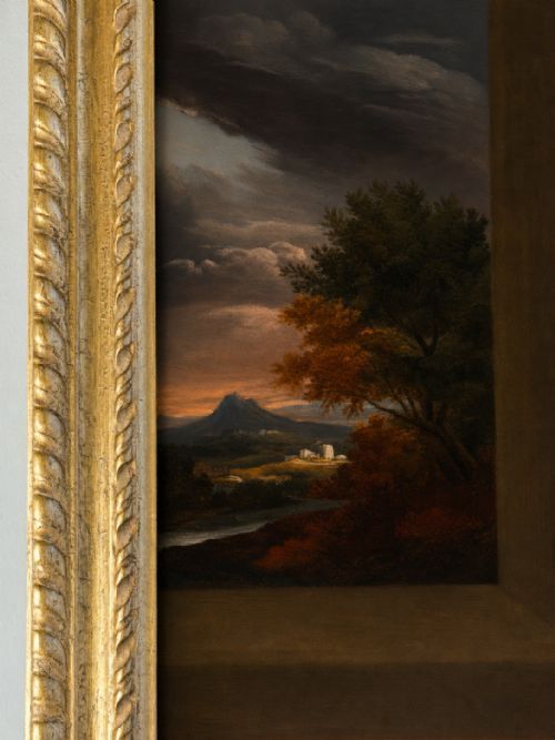 fig 6. A seventeenth-century Baroque oil portrait of a lady in a brown dress and blue drapery, set within a carved giltwood frame.