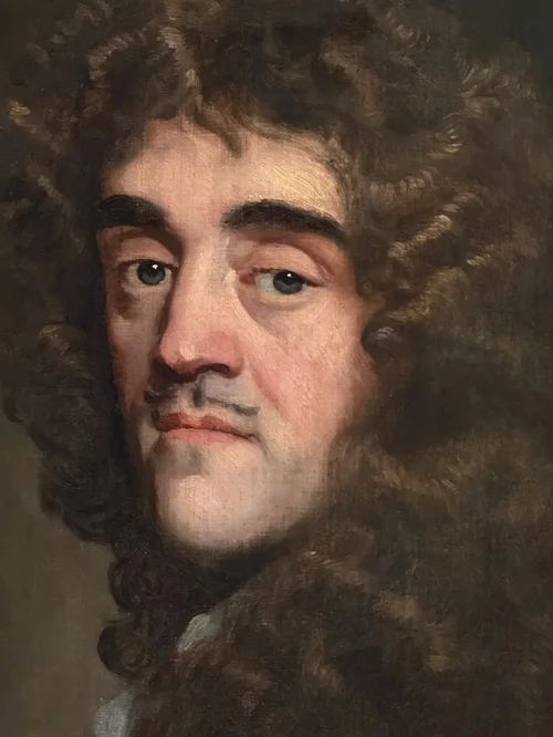 fig 4. A half-length portrait painting of a 17th-century man with dark curling hair, wearing steel plate armour and a red sash against a dark background.