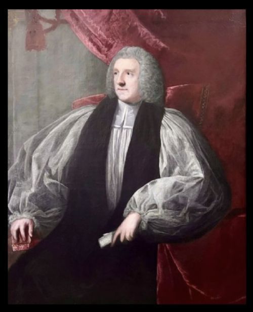 fig 1. An 18th-century oil portrait painting of an archbishop in clerical vestments housed in a carved giltwood frame topped with a mitre cresting.