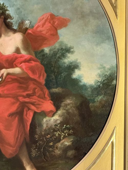 fig 4. A pair of square gilded frames housing circular 18th-century classical oil paintings depicting mythological figures in landscape settings.