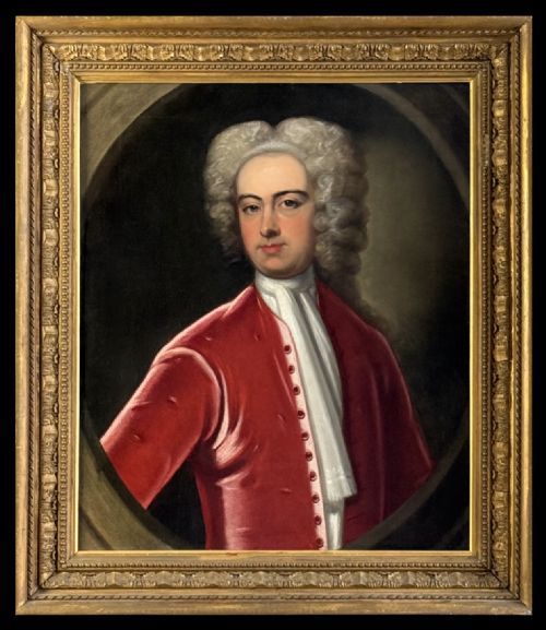fig 5. An early 18th-century oil portrait painting on canvas depicting a gentleman in a red coat and powdered wig within a feigned oval composition.