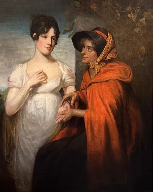 fig 5. An oil painting on canvas in an ornate gilt frame depicting a young lady in a white dress having her palm read by a fortune teller in a red hood.