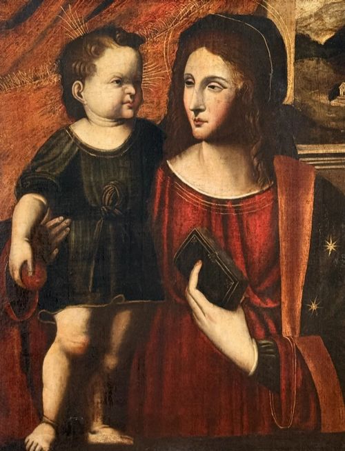 fig 3. An oil on canvas painting featuring the Virgin Mary holding a small book alongside the Christ Child, enclosed in a dark ebonised frame with a gilt inner border.