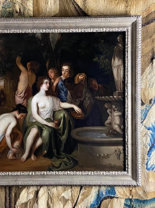 fig 5. An oil painting depicting a mythological scene of the goddess Diana and her attending nymphs seated near a sculpted stone fountain.
