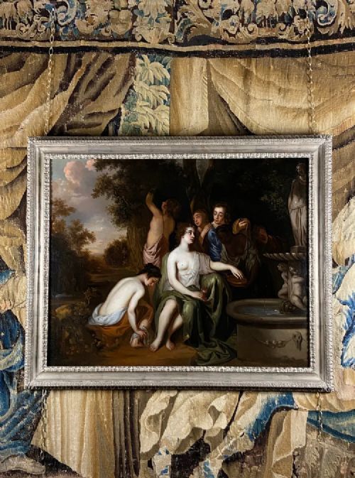 fig 7. An oil painting depicting a mythological scene of the goddess Diana and her attending nymphs seated near a sculpted stone fountain.