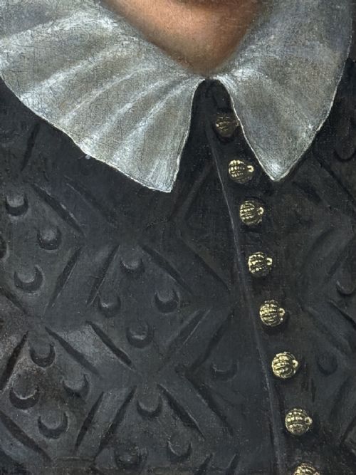 fig 5. An early 17th-century oil portrait on canvas depicting a bearded gentleman wearing a white pleated ruff and a dark patterned doublet.
