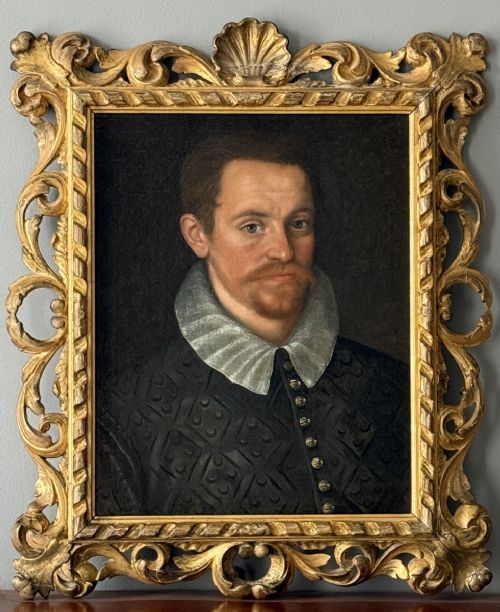 fig 6. An early 17th-century oil portrait on canvas depicting a bearded gentleman wearing a white pleated ruff and a dark patterned doublet.