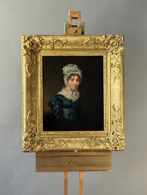 fig 5. A set of three 19th-century Regency oil portraits painted on wood panels, housed in elaborate, heavily carved giltwood frames.