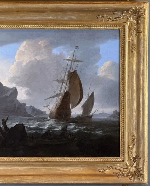 fig 2. An oil painting depicting Dutch sailing vessels in choppy water beside a rocky outcrop, encased in a carved gold frame.