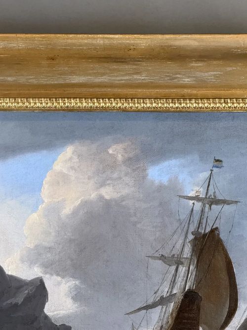 fig 4. An oil painting depicting Dutch sailing vessels in choppy water beside a rocky outcrop, encased in a carved gold frame.
