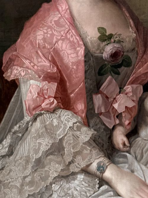 fig 4. An 18th-century oil painting on canvas depicting a seated lady in a lace dress and pink shawl holding a child.