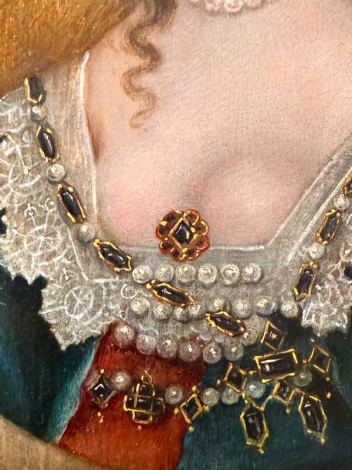 fig 1. A 17th-century oil portrait depicting Queen Henrietta Maria within a feigned oval frame, featuring lace details and pearl jewellery.