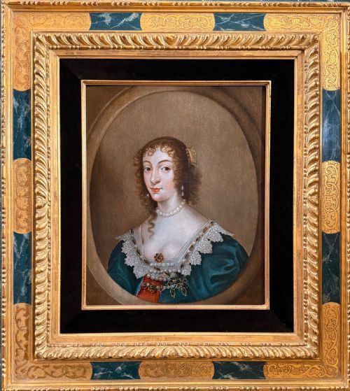 fig 3. A 17th-century oil portrait depicting Queen Henrietta Maria within a feigned oval frame, featuring lace details and pearl jewellery.