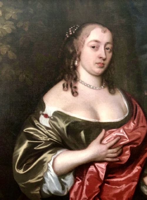 fig 1. An oil painting on canvas depicting a 17th-century seated woman wearing a bronze satin dress with red drapery against an outdoor landscape background.