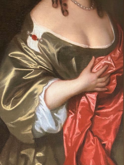 fig 8. An oil painting on canvas depicting a 17th-century seated woman wearing a bronze satin dress with red drapery against an outdoor landscape background.