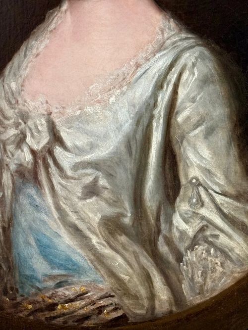 fig 3. An 18th-century oil portrait of a woman wearing a white gown and black choker, set within a feigned oval motif against a dark background.
