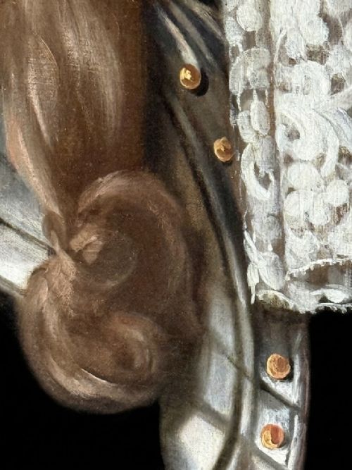 fig 3. A late 17th-century oil painting depicting a gentleman wearing plate armour, a powdered wig, and a lace cravat, set within an oval carved gilded frame.