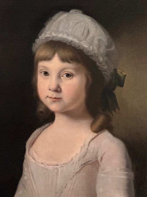 fig 4. An eighteenth-century oil painting on canvas depicting a young girl in a white bonnet and light dress, framed within a feigned oval inside a rectangular gilded wooden frame.