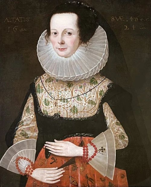 fig 5. A 17th-century framed oil portrait depicting a noblewoman wearing a prominent white linen ruff, an embroidered bodice, lace cuffs, and a black gown.