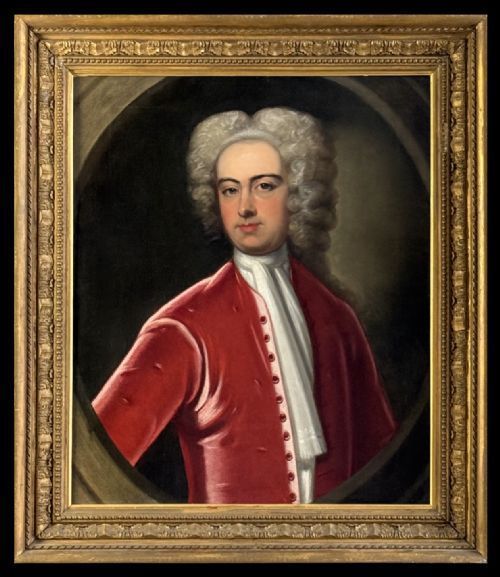fig 2. An 18th-century oil portrait on canvas depicting a gentleman with a powdered wig, white cravat, and crimson coat rendered within a feigned oval frame.