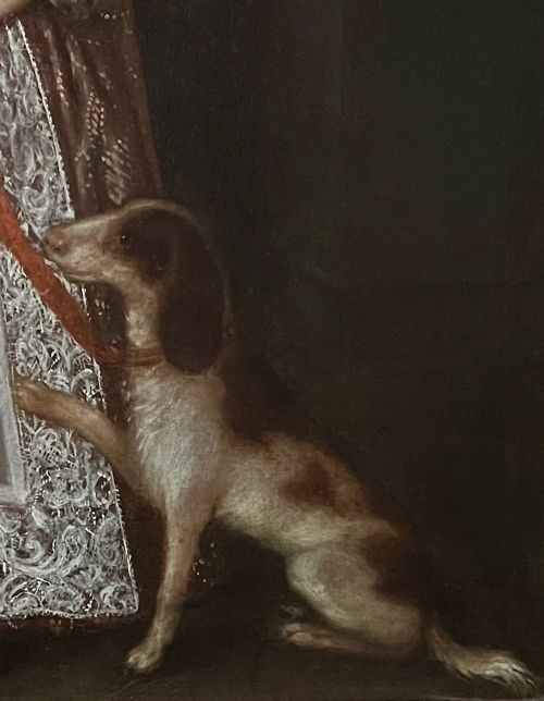 fig 3. A 17th-century oil portrait depicting a young boy standing beside a dog, framed in an ornate giltwood border.